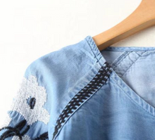 Embroidered Trumpet Sleeved Denim Top