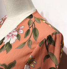 Trumpet-Sleeved Floral Wrap Top